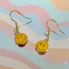 Super cute and well made earrings. Gold accents. Fun Yellow Earrings With Ear Wire, Cute Round Metal Earrings, Trendy Dangle Plug Earrings As Gift, Yellow Novelty Earrings With Ear Wire, Novelty Everyday Dangle Earrings, Novelty Dangle Earrings For Everyday, Trendy Dangle Plug Earrings For Gift, Everyday Novelty Dangle Earrings, Novelty Yellow Earrings With Ear Wire