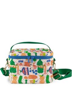 a multicolored lunch bag with green straps and an animal print design on the front