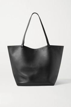 The Row's medium 'Park 3' tote is a timeless, versatile accessory that's great for the office, weekends and travel alike. Sized to hold all your essentials, plus a tablet or notebook, it's been made in Italy from supple leather and has slim, elegant handles. Wear it with: The Row Pants, The Row Sweater, The Row Shirt, The Row Ballet flats. -- Black leather - Toggle fastening at open top - Made in Italy Chic Leather Laptop Bag For On-the-go, Sleek Soft Leather Tote Bag, Sleek Travel Tote Bag, Sleek Leather Bag For Daily Use, Sleek Daily Bags With Leather Handles, Sleek Travel Shoulder Bag With Leather Handles, Sleek Tote Bag For Daily Use, Sleek Large Capacity Bag For Everyday Use, Sleek Leather Bags With Large Capacity