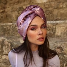 This sequin Turban is a statement piece perfect for accompanying your holiday and special occasion outfits. Featuring a gorgeous wavy detail that adds dimension and subtly steals the show with its soft blush color, this unique turban is bound to get those compliments rolling.  The best part? This turban is designed to be worn 'as is'!  Each turban was designed with comfort, style, and wearability in mind, so there is absolutely no trying or closing involved. Simply place the turban on your head Bohemian Headwrap Headband For Party, Bohemian Party Headband Headwrap, Elegant Party Headband Headscarf, Elegant Party Headscarf Headband, One Size Party Headband Headscarf, One Size Party Headscarf Headband, Party Headband Headwrap One Size, Party Headwrap In Headband Style, Elegant Pink Turban For Party