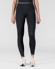 The AYA or "Accentuate Your Assets" leggings look as good as they sound. These leggings feature an exaggerated "booty v" shape to contour and highlight your hard-earned booty gains. Designed with our best-selling Lux fabric and a seamless waistband fit to ensure you're prepared to hit that next P.R. These are a mid-rise legging! Stretch Black Leggings With Contoured Waistband, Black Stretch Leggings With Contoured Waistband, Black Sporty Leggings With Contoured Waistband, Squat Proof Full Length Running Leggings, Black Fitted Squat Proof Leggings, Fitted Black Squat Proof Leggings, Black Squat Proof Fitted Leggings, Black Micro-elastic Squat Proof Tights, Tight Squat Proof Athleisure Leggings