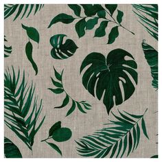 a green and white tropical leaf print on linen fabric, with large leaves in the background