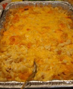 a casserole dish with macaroni and cheese in it, ready to be eaten