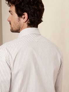 Altogether timeless and easy to wear, our classic oxford shirt is crafted from a luxurious cotton fabric with a touch of stretch for sophisticated style that performs under pressure.  TAILORED SLIM FIT: More at-ease than our slim fit.  Expertly tailo Oxford Dress, Under Pressure, Oxford Shirt, Sophisticated Style, Dress Shirt, Chef's Jackets, Banana Republic, Oxford, Perfect Fit