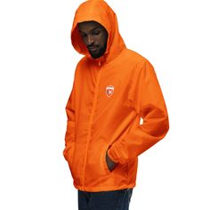 Orange -Light as a feather, this jacket is your go-to windbreaker for any outside adventure. Pack it in your travel bag and explore the outdoors protected and dry (did we mention it's water-resistant?). * 100% polyester  * Interior water-resistant coating * Waterproof pressure resistance: 600 mm * Fabric weight: 2.5 oz/yd² (84.8 g/m²) * Regular, comfortable fit * Matte finish eyelets and zippers * Rubber zipper pull tab * Reversed zipper tape * Three-panel hood with a fine mesh liner * Scuba nec Sporty Weatherproof Windbreaker For Camping, Casual Windbreaker With Adjustable Hood For Camping, Casual Windbreaker With Double-lined Hood For Hiking, Durable Long Sleeve Windbreaker For Hiking, Casual Long Sleeve Raincoat For Camping, Casual Windproof Windbreaker For Camping, Casual Waterproof Windbreaker For Camping, Urban Hooded Jacket With Moisture-wicking For Outdoor Activities, Sporty Windproof Windbreaker For Camping