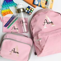 Personalised Back to School Sets I Customised Backpack for Kids, Boys & Girls, Back to School Essential Backpack, Lunch bag, Pencil case and Water Bottle Perfect gifts for children heading back to school. Each set of 4 includes a Back Pack, Lunch Bag, Pencil Case and Water Bottle Each product is personalised with an initial and a name overlay. The font style is standard but you can choose to add a customised design, e.g. Khanda by selecting an option if required. Colours available  - Navy - Pink Rectangular Cases For Students, Back To School, Rectangular Cases For Students Back To School, Back To School Portable Cases For Students, Pink School Case For Back To School, Pink Cases For School, Back To School Season, Pink Cases For Back To School, Pink Rectangular Case For Back To School, Pink Rectangular Cases For Back To School, Back To School Student Backpack Pencil Case