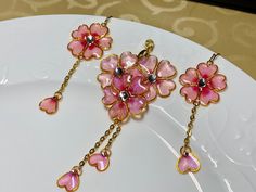 Items are made of UV resin Pink Jewelry Sets For Valentine's Day, Pink Dangle Jewelry Sets For Gifts, Pink Gold Flower-shaped Jewelry Gift, Pink Gold Flower Shaped Jewelry Gift, Elegant Pink Jewelry With Pressed Flowers, Elegant Pink Pressed Flowers Jewelry, Pink Jewelry Sets For Mother's Day, Pink Dangle Jewelry With Pressed Flowers, Pink Flower-shaped Jewelry Sets For Gifts