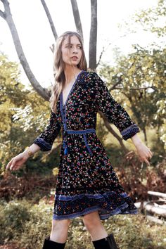 Meet our Alannah Playdress, the mini version of our striking gown, the Alannah Maxi Dress. This cute playdress perfectly showcases our whimsical Ditsy Charm print and is the ultimate versatile piece that you will reach for day after day. The Alannah Playdress is the ultimate combination of comfort and effortless bohemian styling with a flirty twist. Take it to work with an ankle boot or heels, or dress down your look with sneakers or flats for comfortable weekend style. Perfect for long lazy lun Black A-line Bohemian Dress, Black Bohemian A-line Dress, Bohemian Multicolor Ditsy Floral Dresses, Multicolor Bohemian Ditsy Floral Print Dresses, Bohemian Multicolor Ditsy Floral Print Dresses, Black Boho Print Spring Dress, Floral Print Mini Dress For Festival, Bohemian V-neck Mini Dress For Garden Party, Black Bohemian V-neck Dress