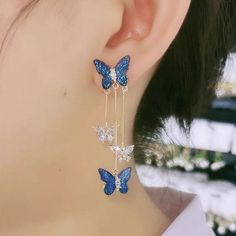 Color Crystal Butterfly Dangle Earrings Add a pop of color and charm to your look with these adorable Color Crystal Butterfly Dangle Earrings. Perfect for any occasion, these earrings are sure to catch everyone's attention and make you stand out. Made with high-quality materials, these earrings are durable and comfortable to wear. Butterfly Dangle Earrings, Flying Flowers, Daily Hairstyles, Crystal Butterfly, Daily Jewelry, Wedding Banquet, Tassel Drop Earrings, Enamel Bracelet, Dangling Earrings