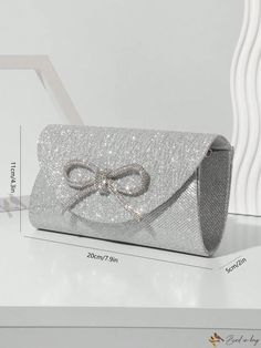 Bird in Bag - Premium Silver Evening Bag with Chain, adorned with Mini Glitter Rhinestone Bowknot: Ideal for Party or Wedding, a Must-Have Hand Bag for Fashionable Women Elegant Glitter Bag For Events, Elegant Sparkling Bags For Prom, Elegant Sparkling Bag For Party, Silver Glitter Clutch For Evening, Elegant Glitter Evening Bag For Prom, Silver Glitter Evening Clutch, Elegant Sparkling Party Bag, Elegant Sparkling Party Bags, Silver Bags For Wedding And Party Season