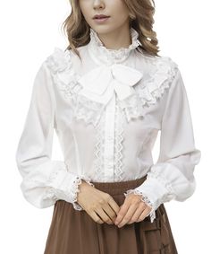 PRICES MAY VARY. [STYLE]: long sleeve ladies blouse with a unique blend of vintage, Victorian, renaissance and steampunk elements. [FEATURES]: button placket, stand-up collar design, big bow, ruffles, cute lantern sleeves, vintage lace, lovely gothic lolita style. [Material]: made of skin-friendly, breathable, lightweight, soft polyester fabric, slim fit wearing comfortable. [Occasions]: Suitable for role-playing parties, masquerade parties, Halloween themed parties, steampunk gatherings, renais Frilled Sleeves Blouse, Vintage Ruffle Blouse, Lace Clothing Aesthetic, Bow Collar Shirt, Angelcore Clothes Male, Lace Button Up, White Button Down Outfit Women, White Fancy Shirt, Casual Victorian Outfits