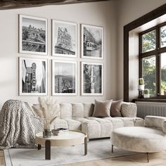 a living room filled with lots of furniture and pictures on the wall above it's windows