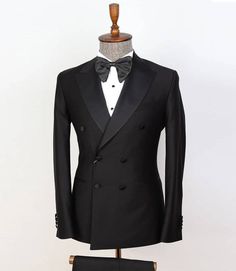 Mens Two Piece Black Tuxedo
Experience timeless sophistication with our Double Breasted Two Piece Men's Black Tuxedo. Meticulously crafted, this tuxedo exudes elegance. The double-breasted jacket features a classic peak lapel and six-button front, channeling vintage charm. Accompanied by impeccably tailored trousers, it ensures a sleek, flattering fit. Perfect for formal events, weddings, or any occasion demanding refinement. Make a statement in this iconic black tuxedo, symbolizing classic soph Classic Black Blazer For Wedding, Slim Fit Tuxedo For Groom, Black Fitted Double Breasted Suit For Party, Fitted Black Double Breasted Suit For Party, Classic Black Three-piece Suit For Groom, Fitted Double Breasted Suit For Groom, Classic Black Double Breasted Suit For Black-tie Events, Classic Black Double Breasted Suit For Wedding, Elegant Tuxedo For Groom