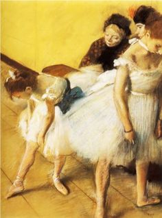 three ballerinas in white tutus, one is holding the other's leg