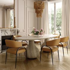 an elegant dining room with marble table and chairs