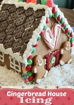 a gingerbread house is decorated with candy and cookies