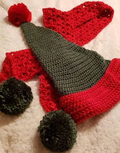 Red and Green Pom-Pom accented ELF HAT and SCARF set perfect for Cristmas and everyday winter wear. A cute conversation maker made with simply soft yarn. Both Men and Women can be a Santas Elf. Cute and whimsy for women, and smart and eye catching for a man wearing it under his leather jacket collar. Scarf Length: 74in                           Hat Length: 21in(folded) Scarf Width: 5in                               Hat Width: 11.5in(at widest) All my handbags are ready to ship. I never make the exact bag twice, even for custom made to order requests. So feel assured you are the ONLY one with this exact bag!! 1-3 Business Days Processing Time NO RETURNS or EXCHANGES. Cancellations can be made withing 12 hours of ordering.  NOT RESPONSIBLE FOR LOST OR RETURNED ITEMS DUE TO INCORRECT ADDRESSE Green And White Elf Hat, Crochet Elf Hat With Ears, Cute Red Crochet Winter Hat, Elf Scarf, Red Crochet Hat For Spring, One Size, Crochet Santa Hat Green, Cute Conversation, Christmas Red And Green, Green Elf