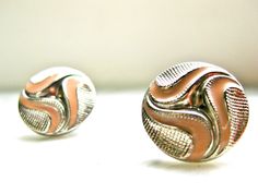 Earrings Peach and Silver 1980's Vintage Clip on Costume Jewelry Detailed Pretty round lightweight vintage earrings that are in excellent vintage condition. They feature a lovely peach color swirl amid silver details.  3/4 inch circles (1.90 cm) Detailed Fashion, Vintage Silver Earrings, Peach Earrings, Color Swirl, Vintage Clip, Earrings Vintage, 1980s Vintage, Fashion Details, Vintage Earrings