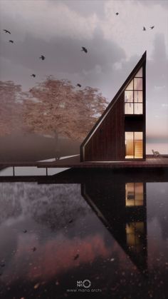 an image of a house on the water with birds flying around