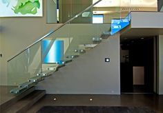 Floating glass walled stairs & art in sleek Hollywood Hills modern home. Stair Art, Beautiful Stairs, Glass Stairs, Steel Stairs