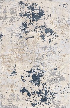 an abstract rug with blue, beige and grey colors on it's surface is shown