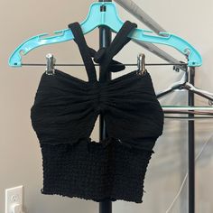 Brand New Never Worn Black Tube Top Ties Around The Neck And Cut Out In The Chest From Urban Outfitters Size Small Stretch Summer Tops For Night Out, Trendy Black Halter Neck Tops, Black Crop Top Tank Top For Beach, Casual Crop Top Halter For Night Out, Casual Halter Crop Top For Night Out, Casual Black Cropped Halter Top, Black Halter Neck Top For Spring, Casual Black Stretch Halter Top, Black Beach Tops For Spring