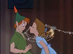 peter pan and tinkerbell kissing in the animated version of peter pan's fairy tale