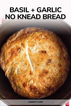 a skillet with bread in it and the words basil and garlic no knead bread