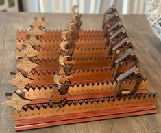 a wooden model of a ship on top of a table