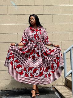 ✨ Embrace the spirit of Africa with our Dashiki Print Long Sundress and let your style speak volumes about your appreciation for global culture and beauty. ✨ Feel the vibrant rhythm of African heritage with our Women's Dashiki Print Long Sundress. Crafted with the timeless elegance of Ankara print, this Print Long Sundress Gown epitomizes cultural grace and modern style. Adorned with intricate patterns and bold colors, each stitch tells a story of tradition and celebration. The flowing silhouette of this maxi dress embodies freedom and comfort, allowing you to move with effortless grace. ✨ Whether you're strolling along sun-kissed beaches or dancing under the stars, this ethnic masterpiece is sure to turn heads and ignite conversations. The flowing silhouette of the maxi dress drapes grace Red Ankara Fabric Short Sleeve Dress, Festival Free Size Maxi Dress, Red Bohemian Dress With Traditional Patterns, Bohemian Red Dress With Traditional Patterns, Flowy Maxi Length Dress For Festivals, Traditional Batik Print Short Sleeve Maxi Dress, Traditional Batik Print Maxi Dress With Short Sleeves, Traditional Long Printed Dress, Traditional Flowy Printed Dresses