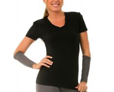 Look your best during workouts with the flattering I.F. Pro Short Sleeve V-Neck Top. The compression fabric on this workout top is great for athletic performance as well as for shaping your figure. Whether you work out at the gym, at a yoga studio or outdoors, this short-sleeve athletic top helps to keep your cool and comfortable during any physical activity. The V-neck style is tasteful and feminine, and you can pick from black, grey or fuchsia pink depending on your favorite fashions. Find a r Breathable Stretch V-neck Activewear, Stretch V-neck Activewear For Pilates, Fitted V-neck Top For Pilates, Compressive V-neck Top For Athleisure, Fitted V-neck Functional Activewear, Fitted V-neck Athleisure Activewear, V-neck Stretch Activewear For Workout, Black V-neck Activewear For Yoga, Sporty Compressive V-neck Top