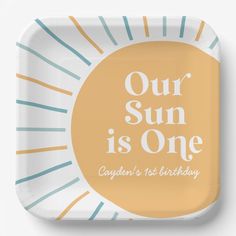 a paper plate with the words our sun is one on it and an orange background