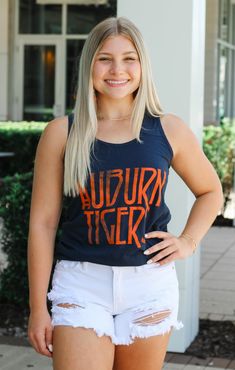 Rep your school everywhere you go with our Auburn Zeppelin Tank Top! It is full length with a flattering scoop neckline. The material is very lightweight to keep you cool all game long. This tank also features the iconic Auburn colors to show some love for your favorite school. Pair with your favorite shorts and strappy sandals. Details: *OFFICIALLY LICENSED* Auburn Tigers Full Length Distressed Graphic Scoop Neckline Lightweight 100% Cotton True to Size Brenna is wearing size Small / Emma is we Casual Tank Top For Game Day In Summer, Casual Summer Tank Top For Game Day, Sporty Cotton Tank Top For College, Casual Scoop Neck Tank Top With Letter Print, Collegiate Cotton Sports Tank Top, Collegiate Cotton Tank Top For College, Sporty Tank Top For College In Summer, Sporty Summer Tank Top For College, Casual Sleeveless Tank Top For Game Day