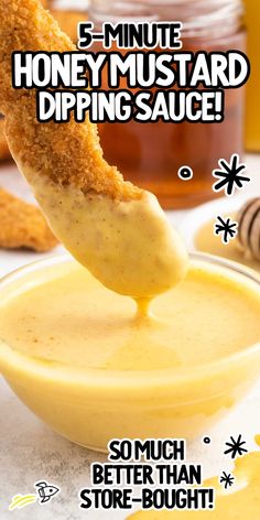 the dipping sauce is being spooned in to a bowl with honey mustard on it