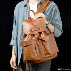 OrcaJump - Classic Leather Backpack with a Timeless Appeal Casual Brown Bag With Leather Backing, Casual Leather-backed Satchel Shoulder Bag, Casual Brown Backpack With Removable Pouch, Brown Backpack For Daily Use, Casual Leather Backpack With Adjustable Strap For Travel, Casual Leather Backpack With Removable Pouch For School, Large Capacity Satchel Backpack For Daily Use, Casual Travel Backpack With Removable Pouch, Large Capacity Leather Backpack