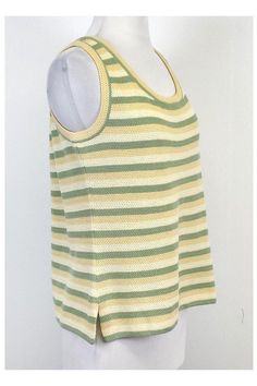 This striped knit top is perfect for casual days. Wear it with shorts or a skirt for a relaxed look. Size Medium Slips on Scoop neckline Shoulder to Hem 22.25" Striped Crew Neck Tops For Vacation, Summer Striped Ribbed Tops, Spring Striped Ribbed Knit Top, Summer Striped Knit Top For Beach, Green Knit Top For A Summer Day Out, Striped Knit Top For Summer Beach, Striped Knit Top For Summer Beach Outings, Green Knit Top For Summer Day Out, Spring Striped Knit Tank Top