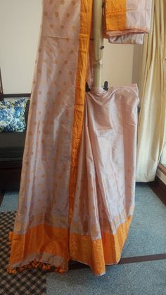 Welcome to our shop, where we take pride in offering you the finest craftsmanship and exquisite textiles. Introducing our pure Muga silk Mekhela Chador, a timeless masterpiece that beautifully combines tradition and elegance. Handwoven with care and precision, this Mekhela Chador is crafted from pure Muga silk, sourced from the silkworm Antheraea assamensis, which is indigenous to Assam, India. Muga silk is known for its lustrous golden hue, unparalleled sheen, and incredible durability. It is c Festive Cotton Silk Sharara With Pallu, Diwali Cotton Silk Anarkali Set With Pallu, Bollywood Style Cotton Silk Pre-draped Saree For Eid, Traditional Cotton Silk Sharara With Cutdana, Cutdana Cotton Silk Sharara For Festivals, Cotton Silk Cutdana Sharara For Festivals, Traditional Navratri Cotton Silk Sharara, Festival Cotton Silk Sharara With Cutdana, Navratri Tussar Silk Anarkali Set With Cutdana