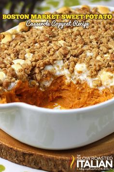 a close up of a casserole dish on a wooden board with the words boston market sweet potato casserole crepe recipe