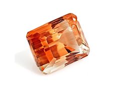 an orange diamond on a white background