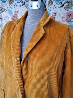 "Classic 70s style! Vintage mustard yellow 2 piece corduroy ladies suit, handmade.  Jacket features spread collar, button close, patch pockets, fully lined.  Skirt wraps closed with double buttons and has a large hem. *Skirt is shown missing a button but it will be fixed before purchase. Size M/Medium.  Jacket Pit to pit 20\", sleeves 30\", length 22\". skirt waist 27-28\", length 25\"." Yellow Suit Aesthetic, Suit Jacket And Skirt, Corduroy Suit, Handmade Jacket, Patchwork Vest, Ladies Suit, Yellow Suit, Ochre Yellow, Yellow Blazer