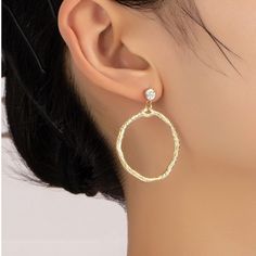 Hammered Hoop Drop Earrings on ear Trendy Hoop Earrings Made Of Alloy, Trendy Alloy Hoop Earrings, Hoop Alloy Jewelry For Party, Party Hoop Alloy Jewelry, Gold Alloy Hoop Earrings, Gold Hoop Earrings In Alloy, Nickel Free Alloy Round Hoop Earrings, Metal Open Circle Hoop Earrings, Metal Hoop Crystal Earrings For Pierced Ears