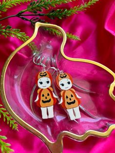 Get ready to show off your love for Sonny Angel with these unique earrings handpainted by the artist themselves. These earrings are perfect for any Sonny Angel fan, featuring adorable designs that capture the essence of Halloween and fall. Handpainted Design: Each earring is carefully handpainted by the artist, ensuring a one-of-a-kind piece. Hypoallergenic Hooks: Safe and comfortable to wear for those with sensitive ears. High-Quality Acrylic Material: Durable and lightweight for everyday wear. Approximately 2.5 Inches in Size: The perfect statement accessory without being too heavy or bulky. Sonny Angel Pumpkin Painting, Cute Hand Painted Earrings For Gift, Cute Hand Painted Earrings As Gift, Fun Halloween Earrings Gift, Halloween Themed Earrings As Gift, Fun Halloween Earrings For Gifts, Cute Handmade Halloween Jewelry, Hand Painted Orange Earrings As Gift, Fun Orange Earrings As A Gift