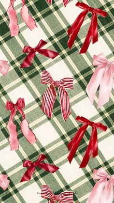 red and white bows on green checkered fabric with pink ribbons in the center,