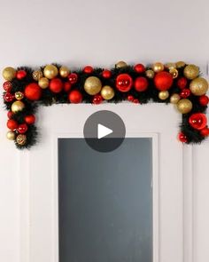 a white door decorated with red and gold ornaments