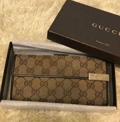 Auth Gucci Fold Purse #7210 Long Wallet   GG Brown Canvas Leather Italy  Description Condition: B (Good Condition But Signs of Small Scratches and / or Stains) Accessory: Box Color Brown Size (Approx): W 19cm H 9.5cm D 2.5cm Size (Approx) : W 7.49inch H 3.75inch D 0.99inch Condition: B  N : (New)  S : (Almost brand new)  A : (Great condition Light signs of use with tiny scratches and/or stains)   B : (Good condition but signs of small scratches and/or stains)  C : (Noticeable signs of use with s Gucci Bifold Wallet With Original Box, Classic Gucci Bifold Wallet, Gucci Brown Formal Wallet, Formal Brown Gucci Wallet, Classic Gucci Rectangular Wallet, Classic Gucci Wallet For Travel, Classic Gucci Travel Wallet, Designer Handbag, Brown Canvas