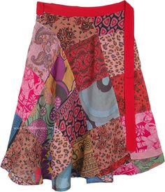 a multicolored skirt with an animal print design on the bottom and red trim