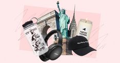 the statue of liberty is surrounded by new york's famous landmarks, including candles and headphones