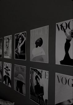 black and white photograph of magazine covers on the wall