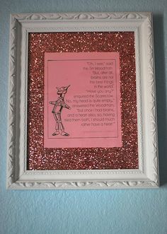 a pink and white frame with a poem on it