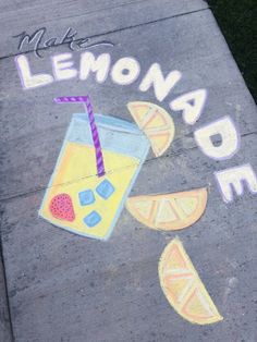 the sidewalk has chalk drawings on it with lemonade